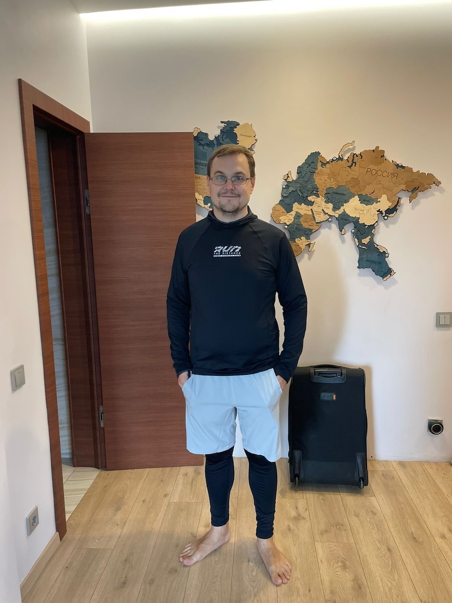 Konstantin Kalinin standing indoors in running clothes